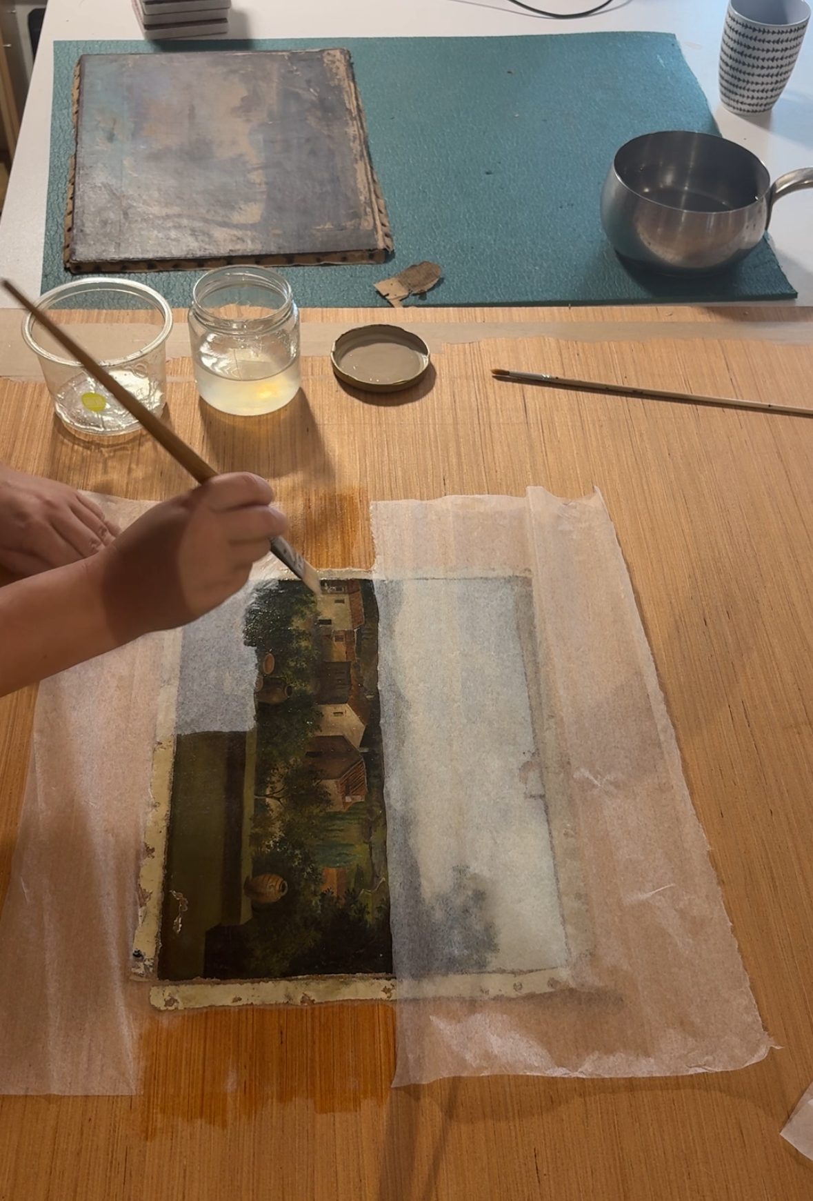 Pose d'une protection de surface sur une peinture